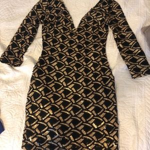 Black and gold sequin mini dress